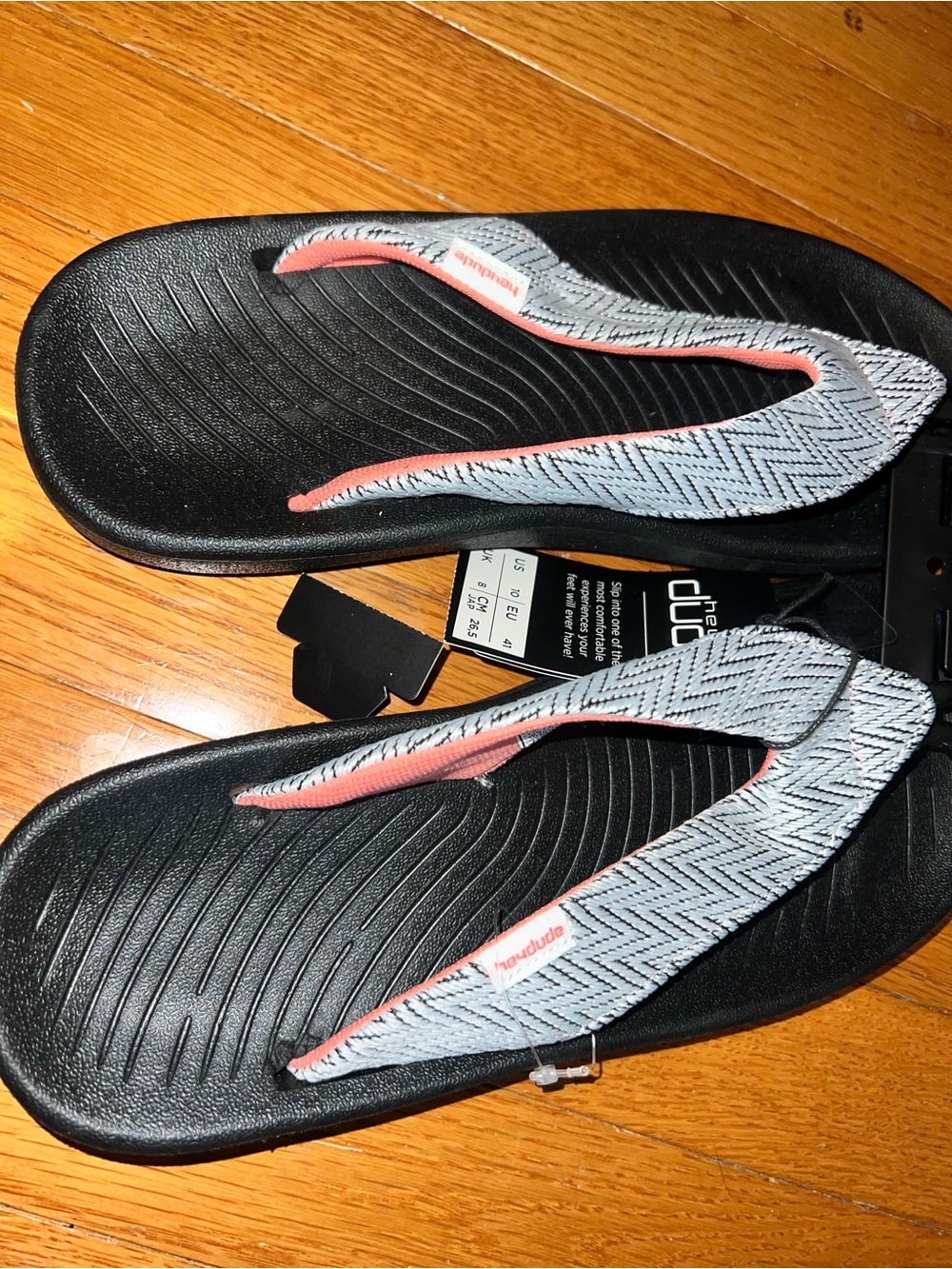 Black Sandal Flip Flops with Gray Chevron Straps and Coral Accents